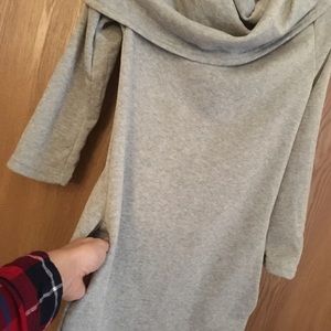 Grey tunic with pockets. Never worn.